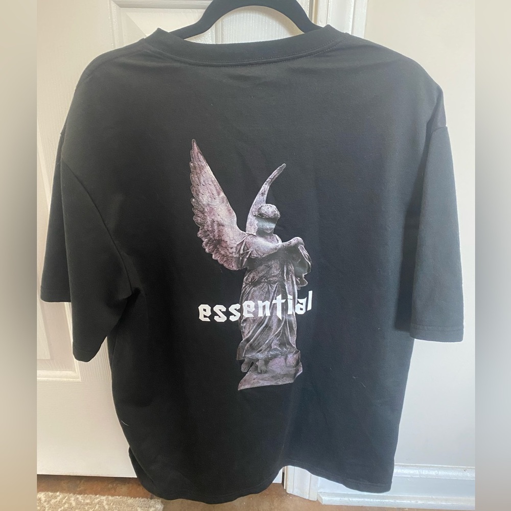 medium oversized essentials angel statue t shirt